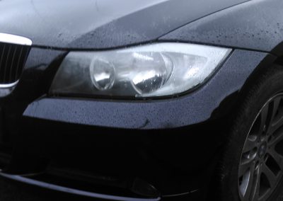 Repaired image of a BMW car with a bumper scuff